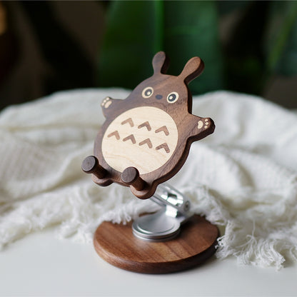 Pipimu Forest Spirits Tori wooden phone stand front view