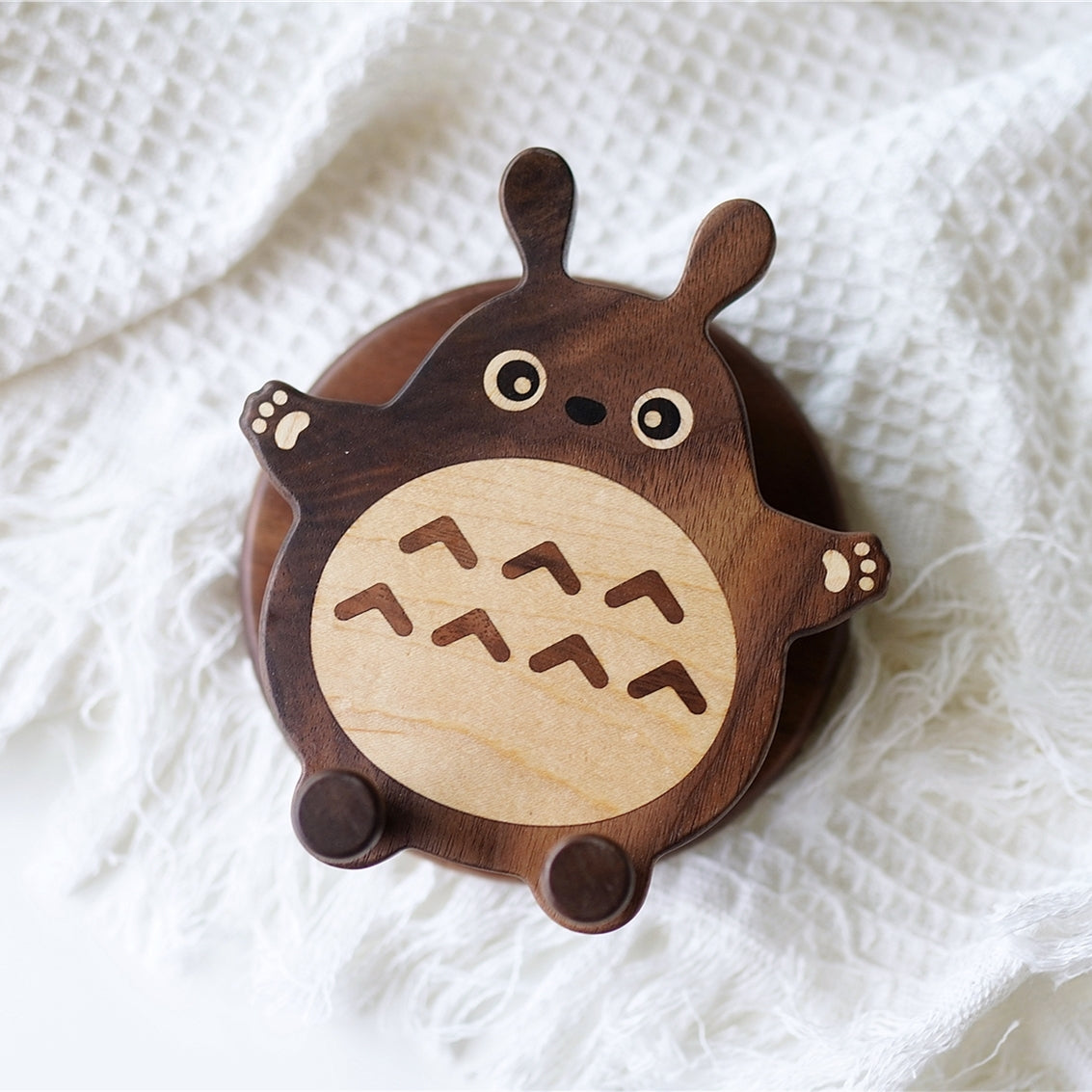 Pipimu Forest Spirits Tori wooden phone stand top view