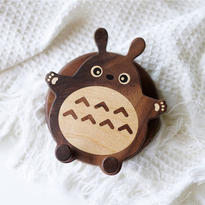 Pipimu Forest Spirits Tori wooden phone stand top view