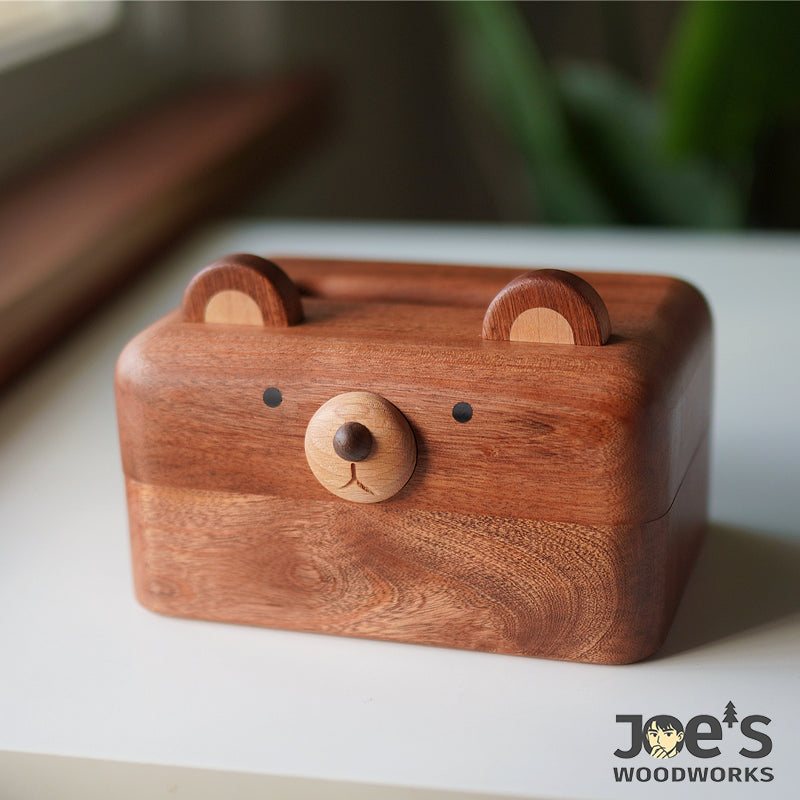 Pipimu Homi Bear hand-carved wooden tissue box front view with bear-face design