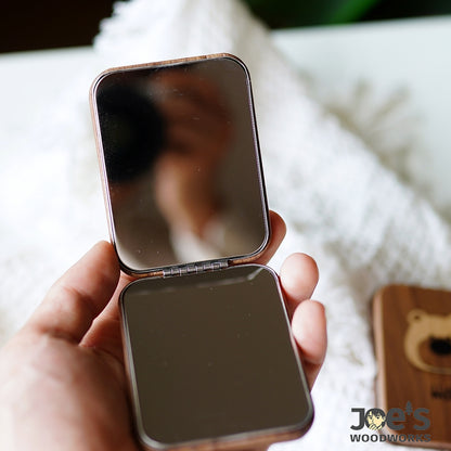 Lumi Bear wooden mirror held in hand for makeup or daily travel use