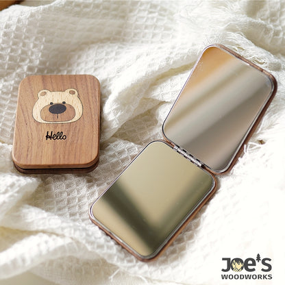 Lumi Bear wooden compact mirror opened showing dual mirrors inside