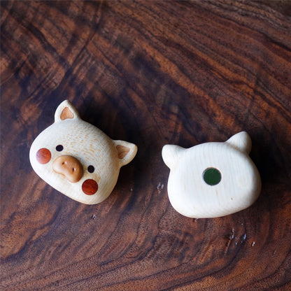 Backside of Pipimu Piggy Nunu wooden fridge magnet with strong magnet