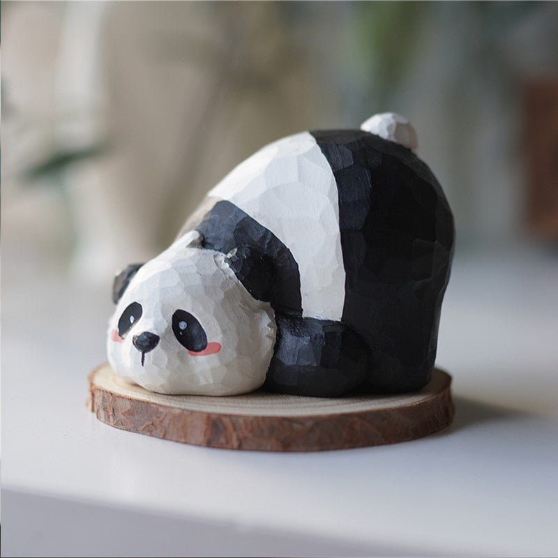 Side view of Pipimu’s Pobo the Panda wooden hand-carved bear figurine