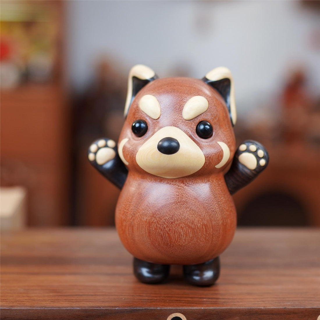 Cute pipimu red panda wooden figurine front view