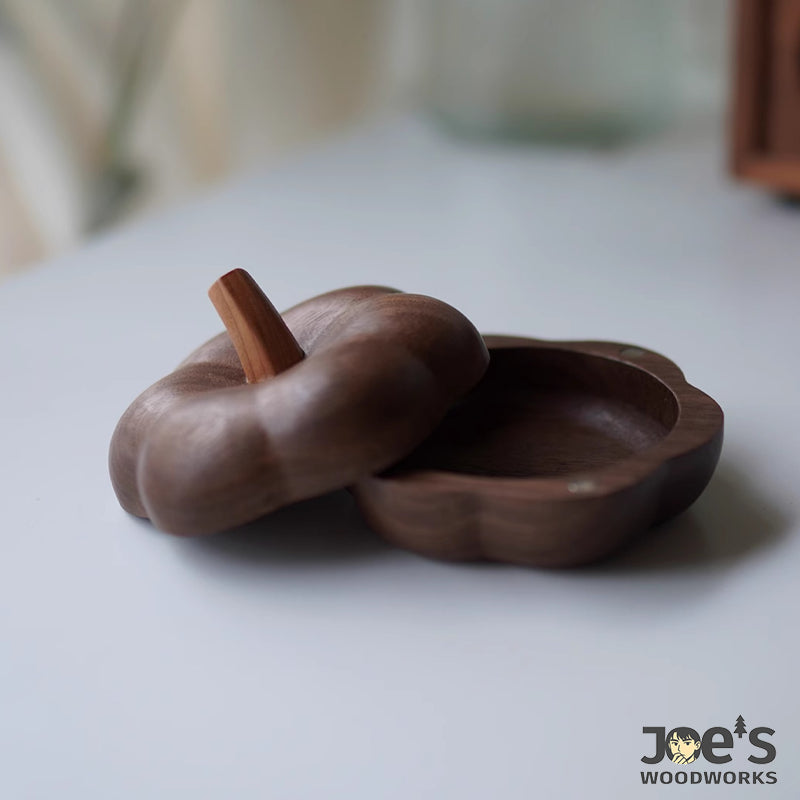 Wooden pumpkin jewelry box with lid open, showing bowl interior, perfect for rings or trinkets