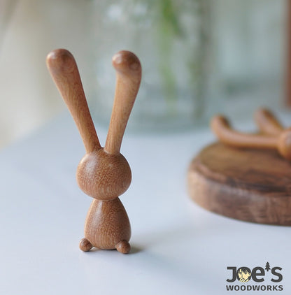 Natural wood rabbit massage stick used as tabletop decor accent