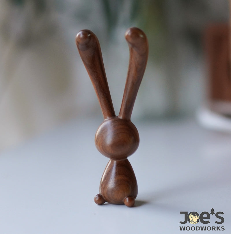 Hand-carved wooden rabbit massage stick by JoesWoodworks, elegant facial tool