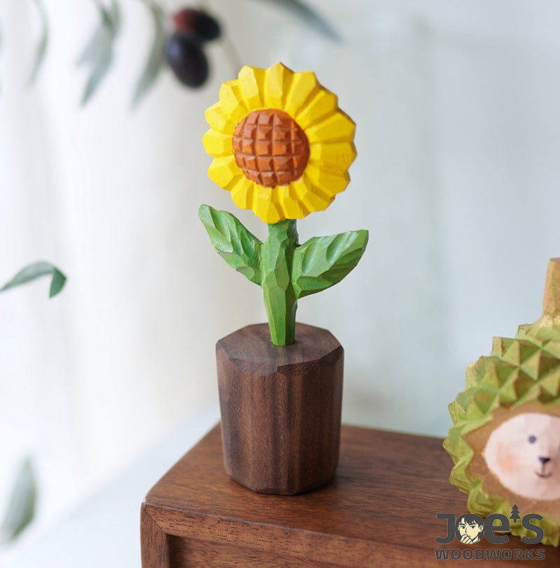 Handcrafted sunflower figurine made of wood placed on shelf with soft natural light