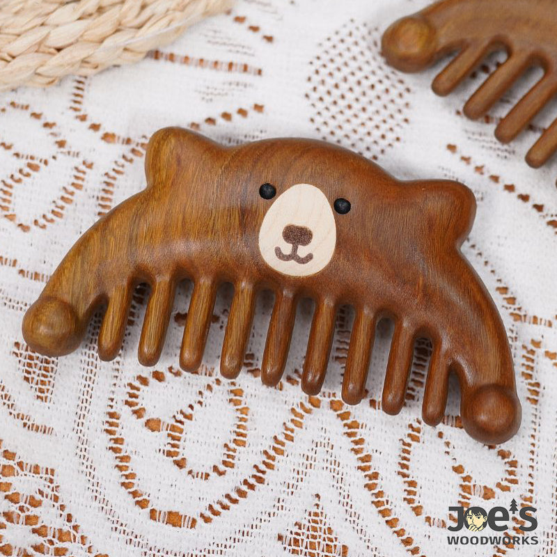 Flat lay of multiple bear wooden combs with cute carved design